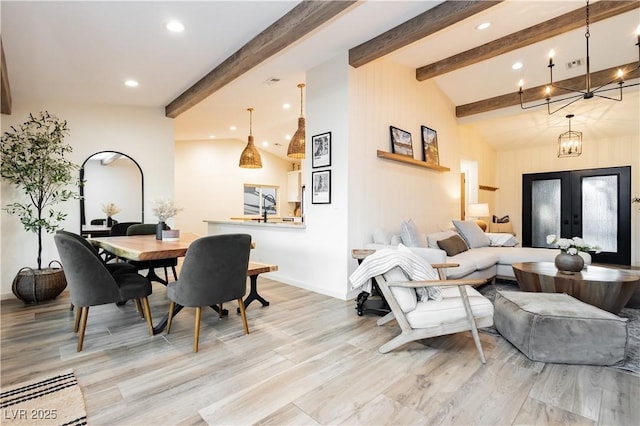 3227 Paintedhills Ave, Las Vegas, NV 89120 - living room with a chandelier, recessed lighting, light wood-style flooring, and french doors