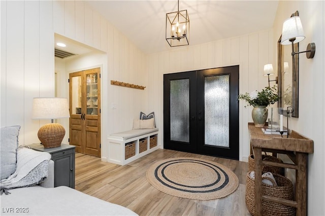 3227 Paintedhills Ave, Las Vegas, NV 89120 - entryway with wood finished floors, french doors, and a chandelier