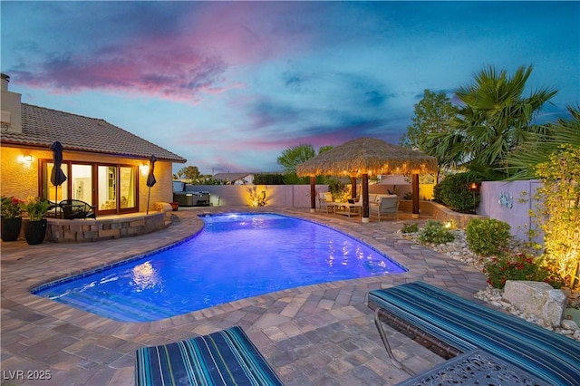 3227 Paintedhills Ave, Las Vegas, NV 89120 - view of pool with a gazebo, a patio, a fenced backyard, and an outdoor living space