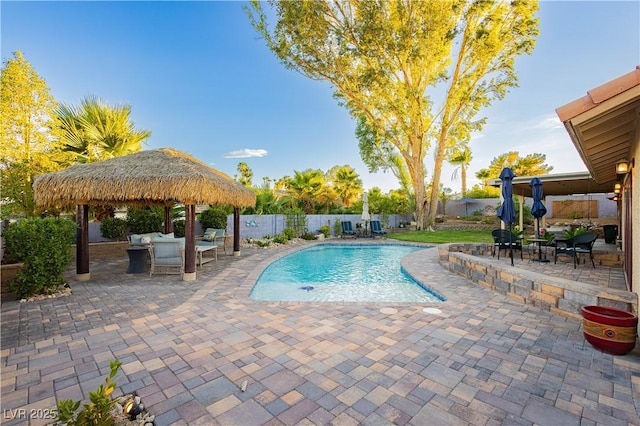 3227 Paintedhills Ave, Las Vegas, NV 89120 - view of pool with a patio area, a fenced backyard, and a gazebo
