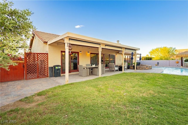 3227 Paintedhills Ave, Las Vegas, NV 89120 - rear view of property featuring ceiling fan, stucco siding, a fenced backyard, and a patio