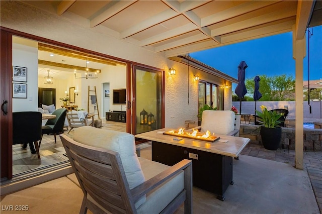 3227 Paintedhills Ave, Las Vegas, NV 89120 - view of patio / terrace with an outdoor living space with a fire pit