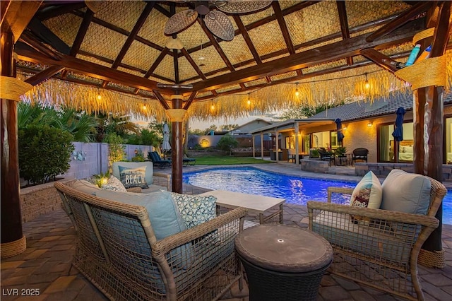 3227 Paintedhills Ave, Las Vegas, NV 89120 - view of swimming pool with a gazebo, ceiling fan, an outdoor living space, and a patio
