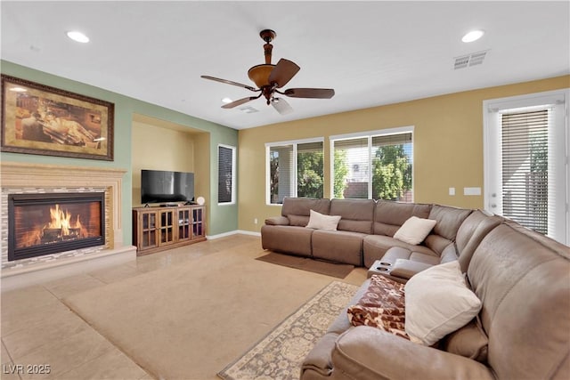 9516 Bluff Ledge Ave, Las Vegas, NV 89149 - living area with ceiling fan, a glass covered fireplace, and recessed lighting