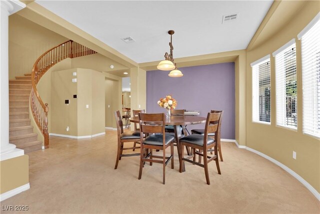 9516 Bluff Ledge Ave, Las Vegas, NV 89149 - dining area with light carpet and stairs