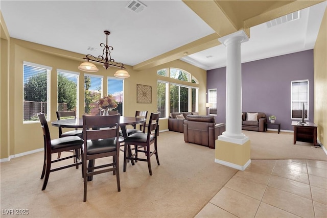 9516 Bluff Ledge Ave, Las Vegas, NV 89149 - dining area featuring light carpet, decorative columns, and light tile patterned floors