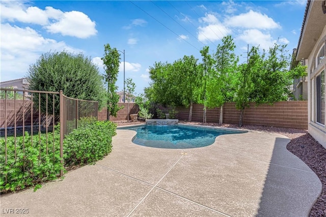 9516 Bluff Ledge Ave, Las Vegas, NV 89149 - view of swimming pool featuring a patio, a fenced backyard, and a pool with connected hot tub