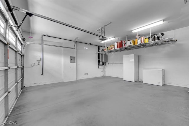 9516 Bluff Ledge Ave, Las Vegas, NV 89149 - garage featuring fridge, a garage door opener, and water heater