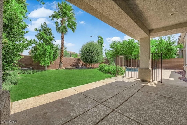 9516 Bluff Ledge Ave, Las Vegas, NV 89149 - fenced backyard with a patio