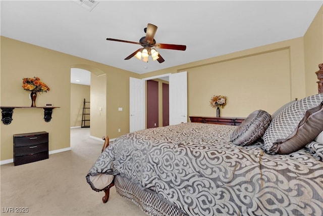 9516 Bluff Ledge Ave, Las Vegas, NV 89149 - carpeted bedroom featuring arched walkways and a ceiling fan