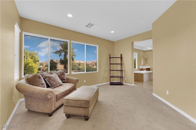 9516 Bluff Ledge Ave, Las Vegas, NV 89149 - living area featuring light carpet and recessed lighting
