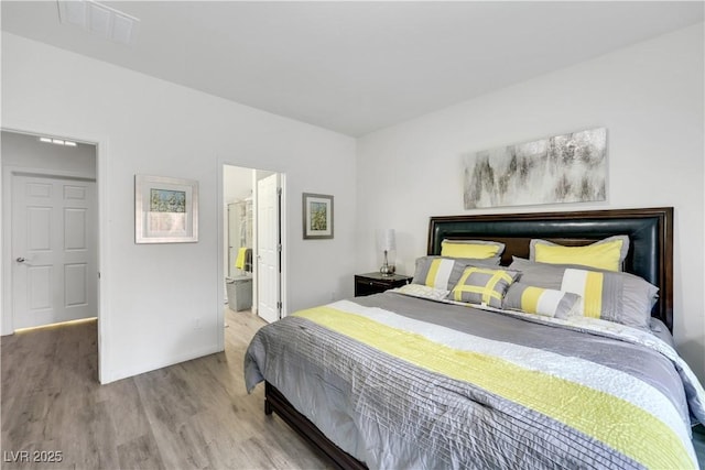 10167 Bishops Peak Ct, Las Vegas, NV 89141 - bedroom with wood finished floors and baseboards