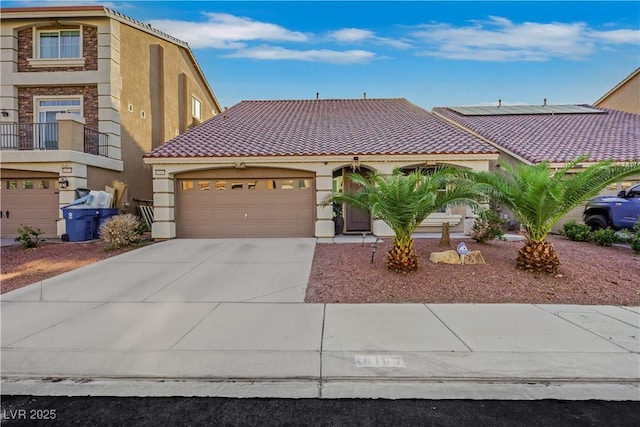 10167 Bishops Peak Ct, Las Vegas, NV 89141 - mediterranean / spanish home with stucco siding, a garage, driveway, and a tiled roof