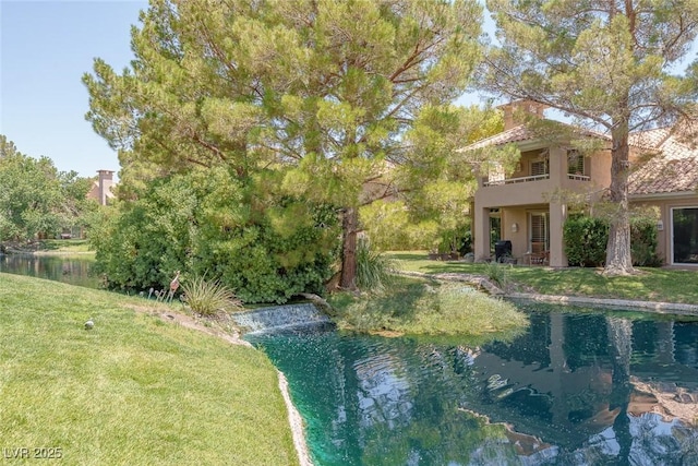 5046 Crooked Stick Way, Las Vegas, NV 89113 - view of green lawn with a balcony