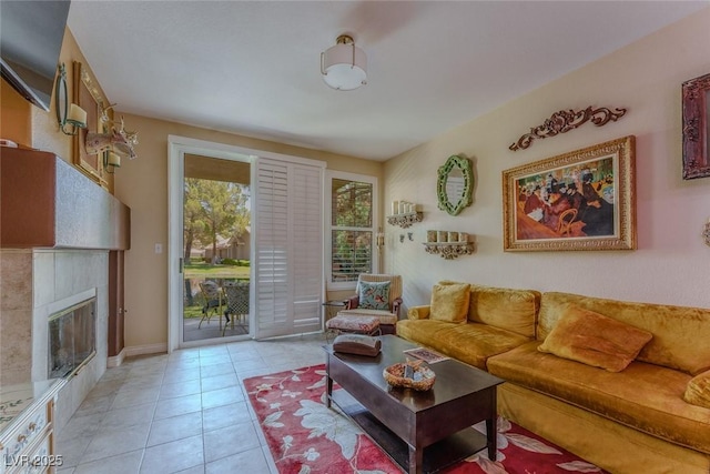 5046 Crooked Stick Way, Las Vegas, NV 89113 - living area featuring light tile patterned floors and a tile fireplace