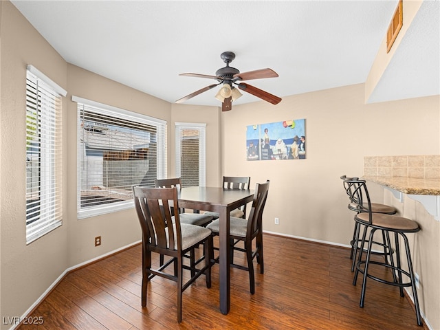 3740 Broadriver Dr, Las Vegas, NV 89108 - dining space with dark wood finished floors and ceiling fan