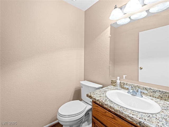 3740 Broadriver Dr, Las Vegas, NV 89108 - bathroom featuring vanity and a textured wall