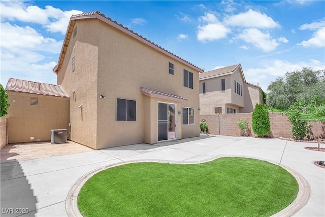 11010 Santorini Dr, Las Vegas, NV 89141 - rear view of property featuring stucco siding, a patio, and a tile roof