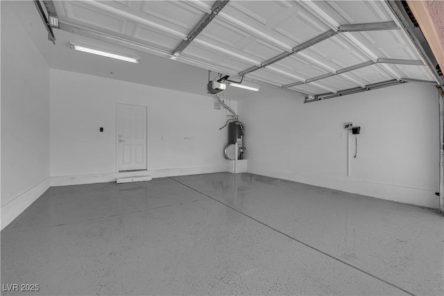 11010 Santorini Dr, Las Vegas, NV 89141 - garage with water heater and a garage door opener