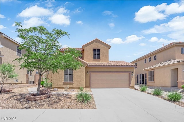 11010 Santorini Dr, Las Vegas, NV 89141 - mediterranean / spanish home with a tiled roof, stucco siding, and concrete driveway