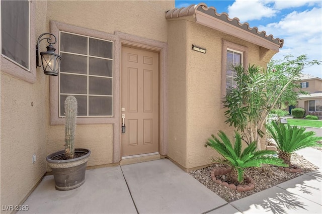 11010 Santorini Dr, Las Vegas, NV 89141 - property entrance featuring stucco siding