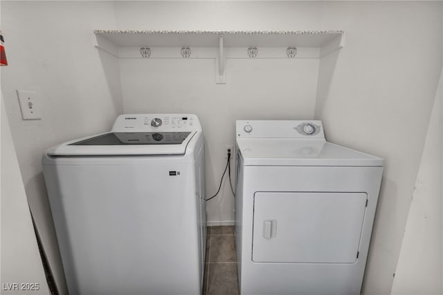 4020 Pistachio Nut Ave, Las Vegas, NV 89115 - laundry room featuring washer and dryer and tile patterned flooring