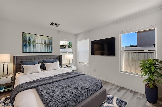 4020 Pistachio Nut Ave, Las Vegas, NV 89115 - bedroom with light wood-style floors and baseboards