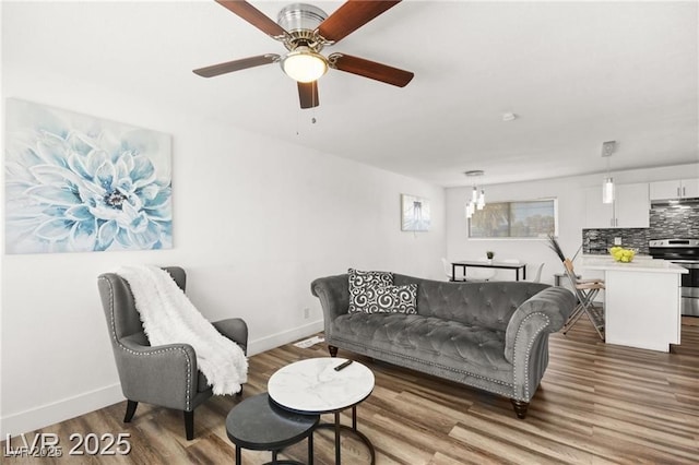 3208 Alcoa Ave, Las Vegas, NV 89102 - living room with wood finished floors and a ceiling fan