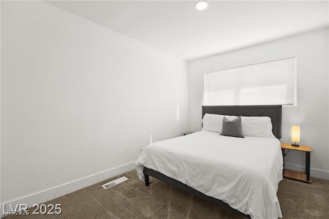 3208 Alcoa Ave, Las Vegas, NV 89102 - carpeted bedroom featuring baseboards