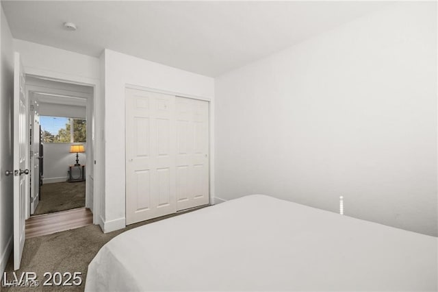 3208 Alcoa Ave, Las Vegas, NV 89102 - carpeted bedroom with a closet and baseboards
