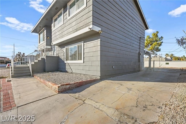 3208 Alcoa Ave, Las Vegas, NV 89102 - view of side of home with concrete driveway