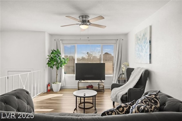 3208 Alcoa Ave, Las Vegas, NV 89102 - living area with wood finished floors and ceiling fan