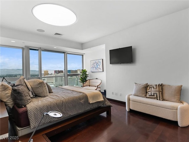 4471 Dean Martin Dr Unit 4308, Las Vegas, NV 89103 - bedroom featuring wood finished floors and baseboards