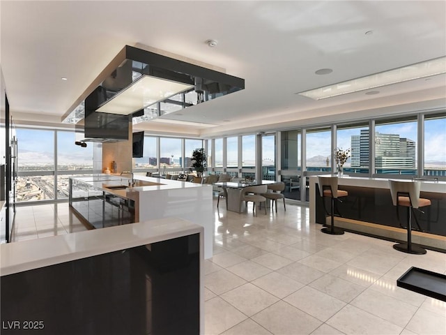 4471 Dean Martin Dr Unit 4308, Las Vegas, NV 89103 - kitchen with tile patterned flooring, floor to ceiling windows, and open floor plan