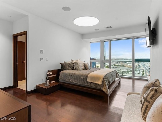 4471 Dean Martin Dr Unit 4308, Las Vegas, NV 89103 - bedroom with wood-type flooring and access to outside