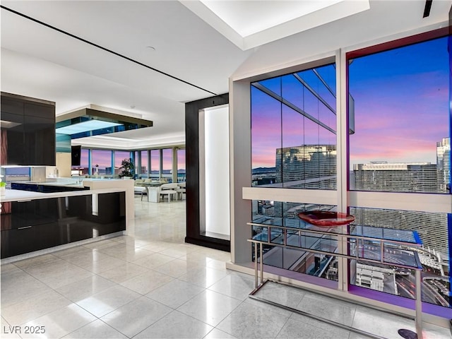 4471 Dean Martin Dr Unit 4308, Las Vegas, NV 89103 - unfurnished room with a raised ceiling and light tile patterned floors