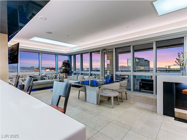 4471 Dean Martin Dr Unit 4308, Las Vegas, NV 89103 - dining area with tile patterned flooring, floor to ceiling windows, and a view of city