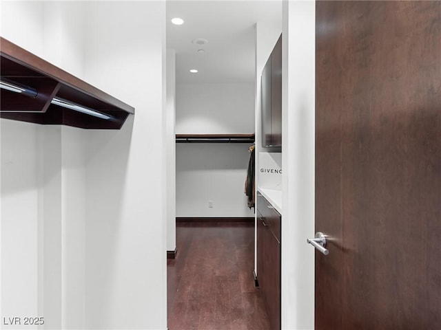 4471 Dean Martin Dr Unit 4308, Las Vegas, NV 89103 - walk in closet with dark wood-type flooring