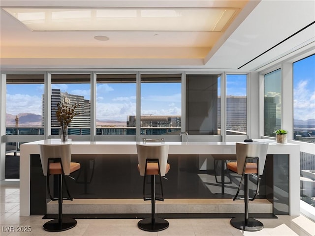 4471 Dean Martin Dr Unit 4308, Las Vegas, NV 89103 - bar area with light tile patterned flooring and plenty of natural light