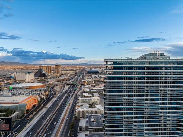 4471 Dean Martin Dr Unit 4308, Las Vegas, NV 89103 - view of urban area featuring a highway and a mountainous background