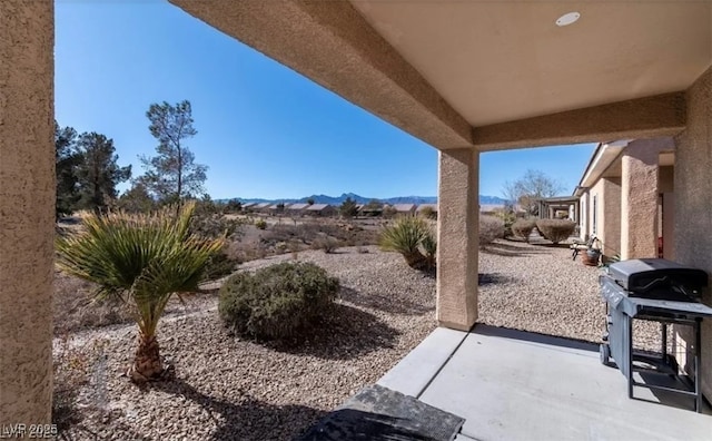 3109 Frigate Way N, Las Vegas, NV 89084 - view of patio featuring grilling area and a mountain view