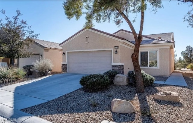 3109 Frigate Way N, Las Vegas, NV 89084 - ranch-style house featuring an attached garage, stucco siding, driveway, and stone siding