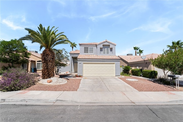 1337 Maplegrove Cir, Las Vegas, NV 89108 - view of front of house with a tiled roof, driveway, stucco siding, and an attached garage