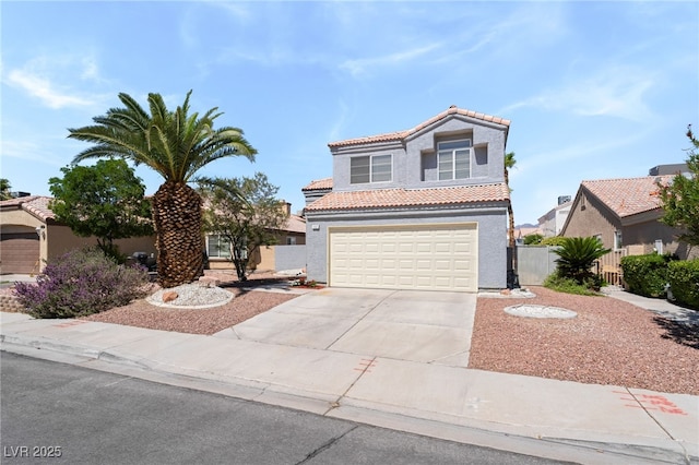 1337 Maplegrove Cir, Las Vegas, NV 89108 - view of front of home featuring a tiled roof, driveway, an attached garage, and stucco siding