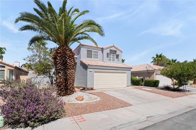 1337 Maplegrove Cir, Las Vegas, NV 89108 - view of front of property with a tiled roof, stucco siding, driveway, and a garage