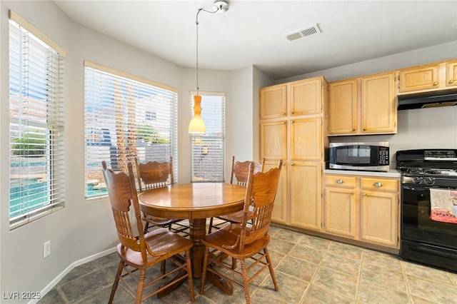 1337 Maplegrove Cir, Las Vegas, NV 89108 - dining room featuring plenty of natural light and light tile patterned floors