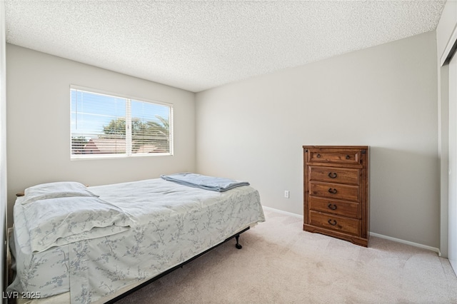 1337 Maplegrove Cir, Las Vegas, NV 89108 - carpeted bedroom featuring a textured ceiling and baseboards