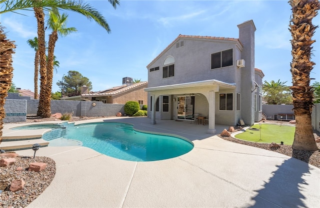 1337 Maplegrove Cir, Las Vegas, NV 89108 - view of pool with a putting green, a patio area, a fenced backyard, and a pool with connected hot tub