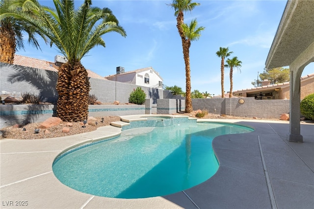 1337 Maplegrove Cir, Las Vegas, NV 89108 - view of pool with a fenced backyard, a pool with connected hot tub, and a patio area
