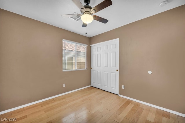 8557 Hidden Pines Ave, Las Vegas, NV 89143 - unfurnished bedroom with light wood-type flooring, a closet, and ceiling fan